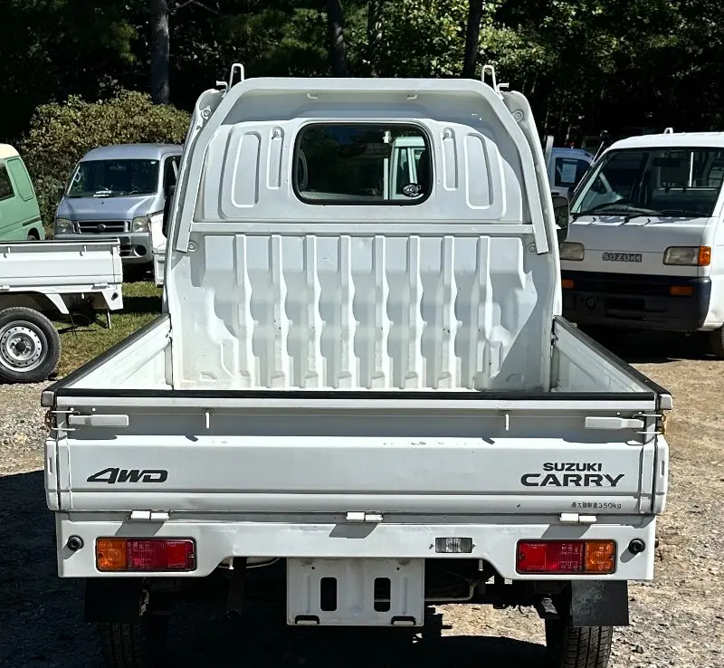2000 Suzuki Carry 4WD, a white Kei Truck, for sale at Mayberry Mini Trucks in Mount Airy, NC (photo 6 of 18)