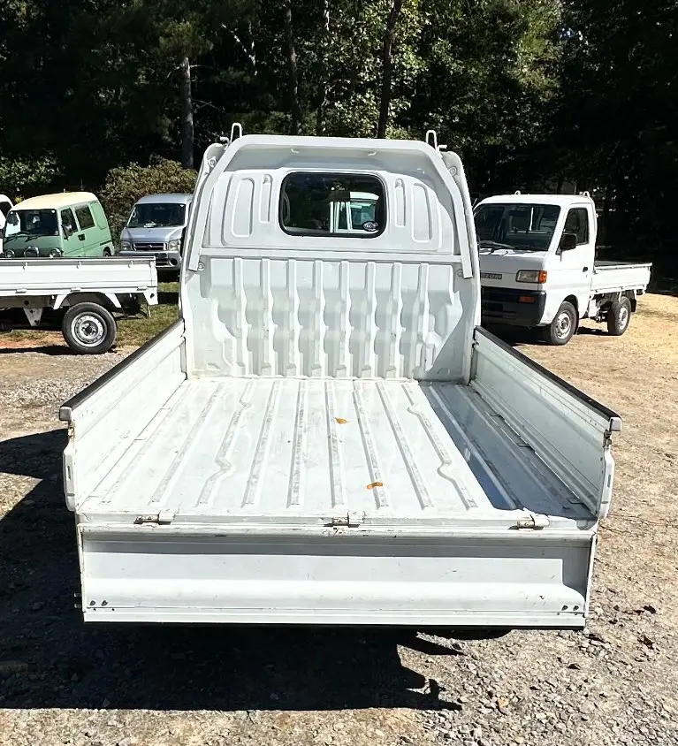 2000 Suzuki Carry 4WD, a white Kei Truck, for sale at Mayberry Mini Trucks in Mount Airy, NC (photo 7 of 18)