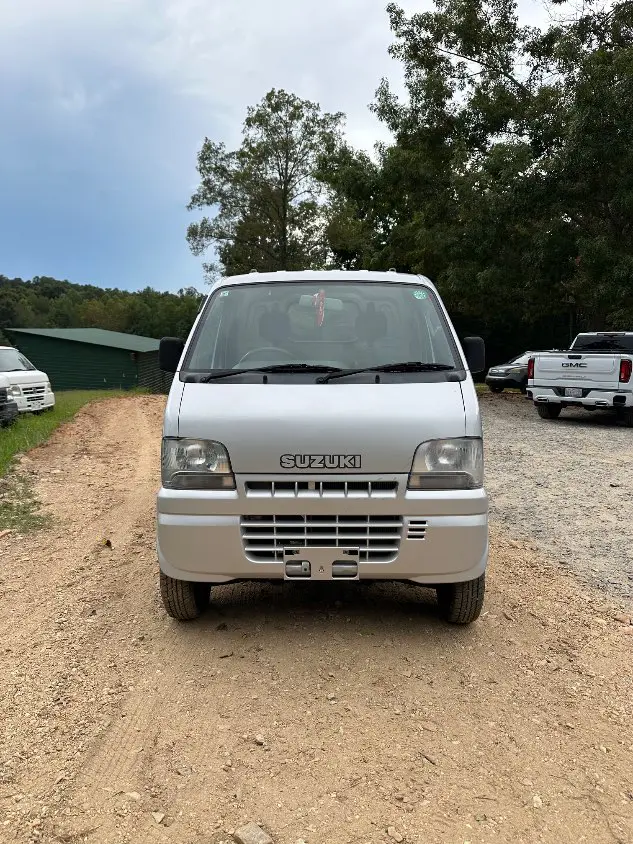 2000 Suzuki Carry 4WD, a silver Kei Truck, for sale at Mayberry Mini Trucks in Mount Airy, NC (photo 1 of 20)