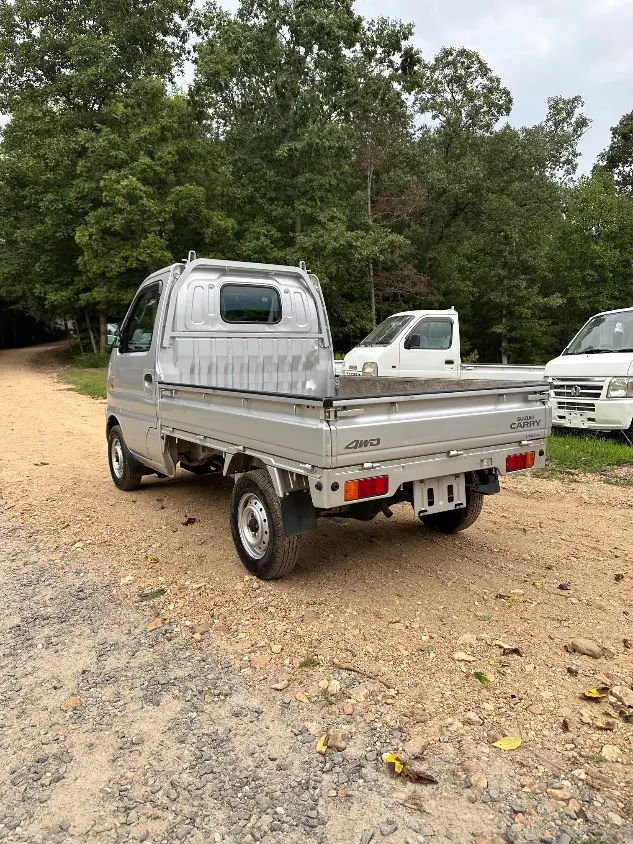 2000 Suzuki Carry 4WD, a silver Kei Truck, for sale at Mayberry Mini Trucks in Mount Airy, NC (photo 11 of 20)