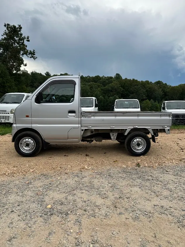 2000 Suzuki Carry 4WD, a silver Kei Truck, for sale at Mayberry Mini Trucks in Mount Airy, NC (photo 12 of 20)