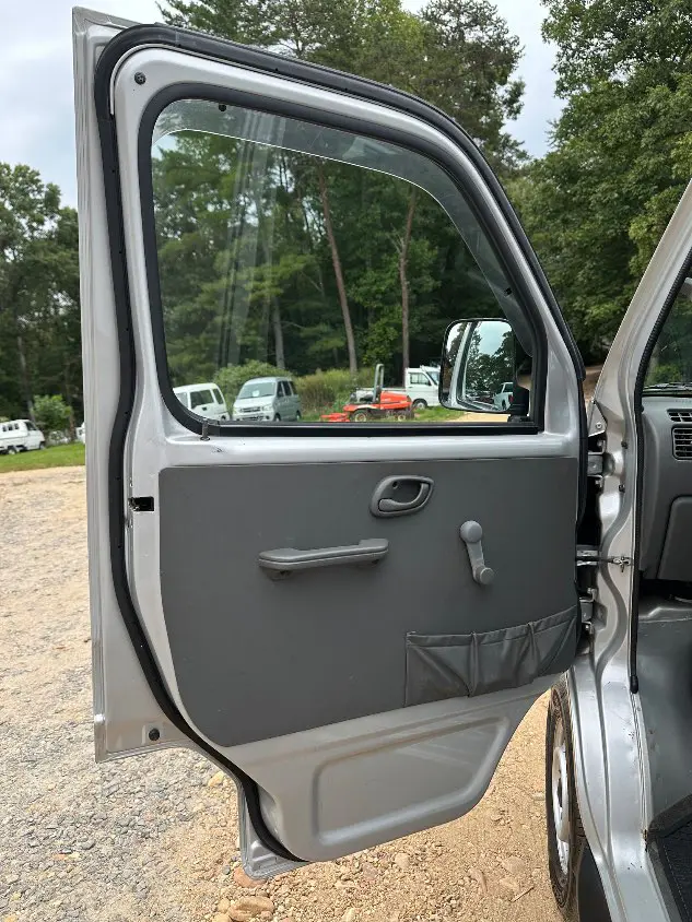 2000 Suzuki Carry 4WD, a silver Kei Truck, for sale at Mayberry Mini Trucks in Mount Airy, NC (photo 13 of 20)