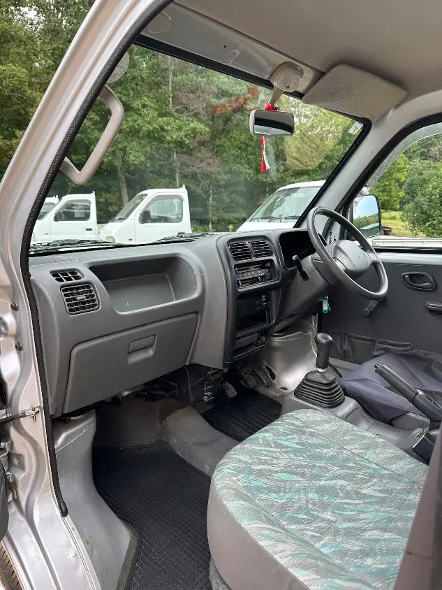 2000 Suzuki Carry 4WD, a silver Kei Truck, for sale at Mayberry Mini Trucks in Mount Airy, NC (photo 14 of 20)