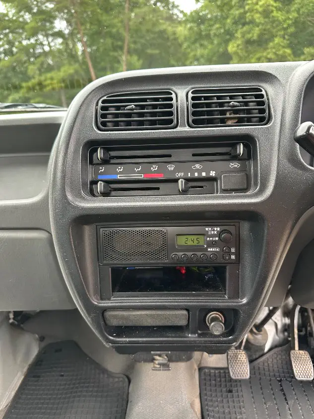 2000 Suzuki Carry 4WD, a silver Kei Truck, for sale at Mayberry Mini Trucks in Mount Airy, NC (photo 18 of 20)