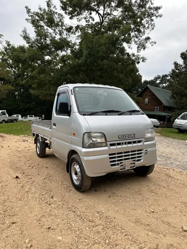 2000 Suzuki Carry 4WD, a silver Kei Truck, for sale at Mayberry Mini Trucks in Mount Airy, NC (photo 4 of 20)