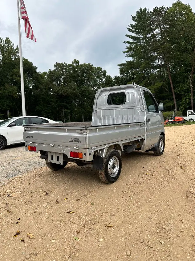 2000 Suzuki Carry 4WD, a silver Kei Truck, for sale at Mayberry Mini Trucks in Mount Airy, NC (photo 6 of 20)