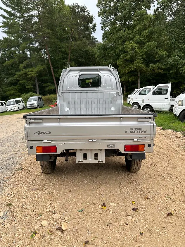 2000 Suzuki Carry 4WD, a silver Kei Truck, for sale at Mayberry Mini Trucks in Mount Airy, NC (photo 7 of 20)