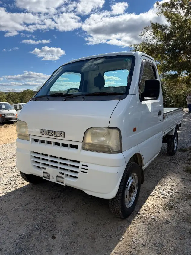 2000 Suzuki Carry 4WD, a white Kei Truck, for sale at Mayberry Mini Trucks in Mount Airy, NC (photo 1 of 19)