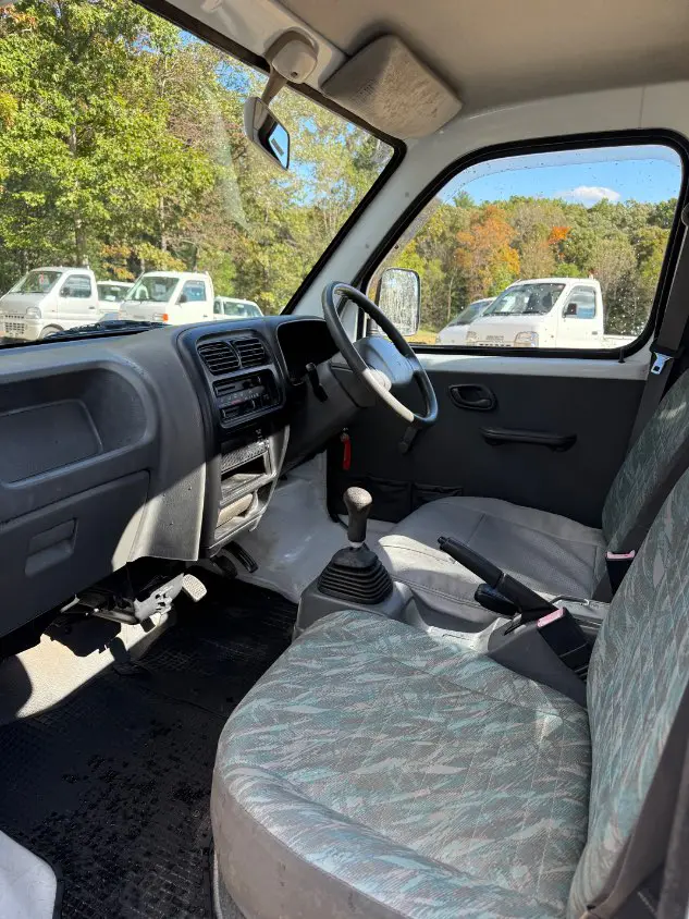2000 Suzuki Carry 4WD, a white Kei Truck, for sale at Mayberry Mini Trucks in Mount Airy, NC (photo 10 of 19)