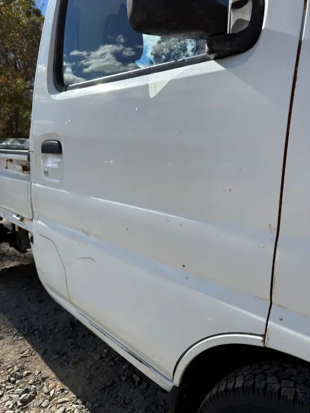 2000 Suzuki Carry 4WD, a white Kei Truck, for sale at Mayberry Mini Trucks in Mount Airy, NC (photo 15 of 19)