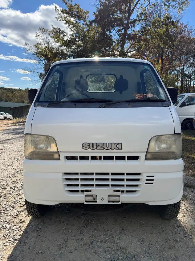 2000 Suzuki Carry 4WD, a white Kei Truck, for sale at Mayberry Mini Trucks in Mount Airy, NC (photo 2 of 19)