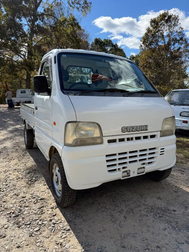 2000 Suzuki Carry 4WD, a white Kei Truck, for sale at Mayberry Mini Trucks in Mount Airy, NC (photo 3 of 19)
