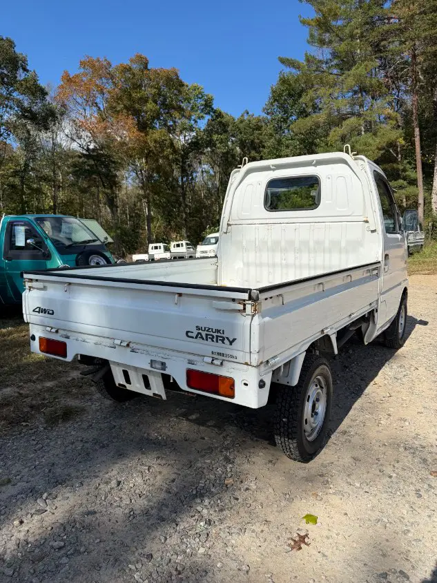 2000 Suzuki Carry 4WD, a white Kei Truck, for sale at Mayberry Mini Trucks in Mount Airy, NC (photo 5 of 19)