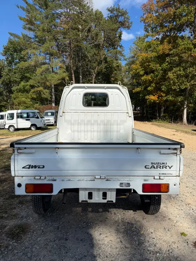2000 Suzuki Carry 4WD, a white Kei Truck, for sale at Mayberry Mini Trucks in Mount Airy, NC (photo 6 of 19)