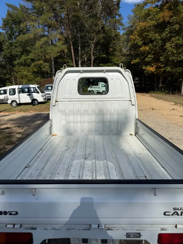 2000 Suzuki Carry 4WD, a white Kei Truck, for sale at Mayberry Mini Trucks in Mount Airy, NC (photo 7 of 19)