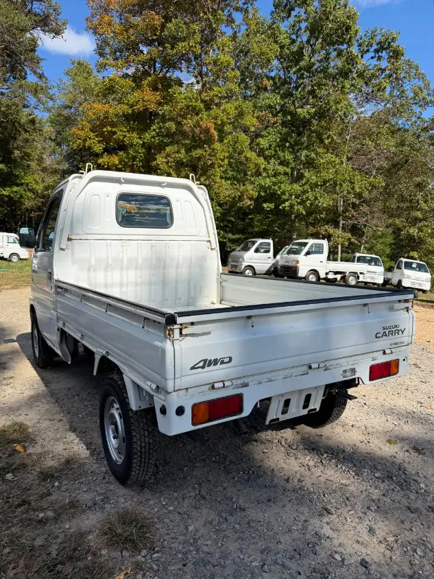 2000 Suzuki Carry 4WD, a white Kei Truck, for sale at Mayberry Mini Trucks in Mount Airy, NC (photo 8 of 19)