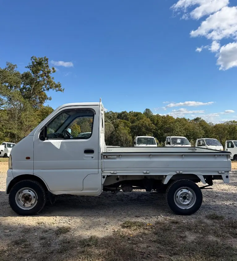 2000 Suzuki Carry 4WD, a white Kei Truck, for sale at Mayberry Mini Trucks in Mount Airy, NC (photo 9 of 19)