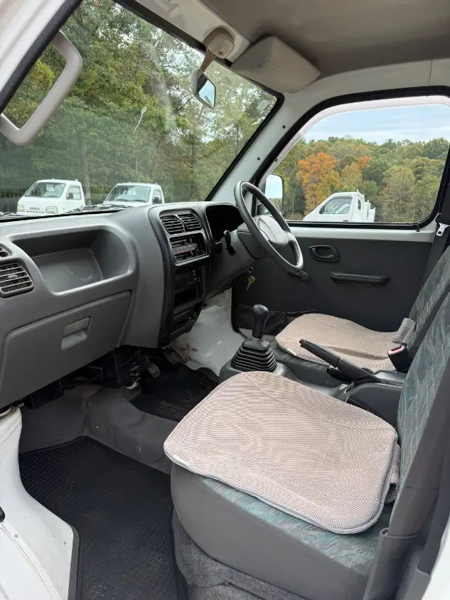 2000 Suzuki Carry 4WD, a white Kei Truck, for sale at Mayberry Mini Trucks in Mount Airy, NC (photo 10 of 18)