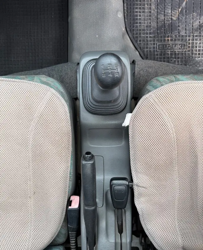 2000 Suzuki Carry 4WD, a white Kei Truck, for sale at Mayberry Mini Trucks in Mount Airy, NC (photo 12 of 18)