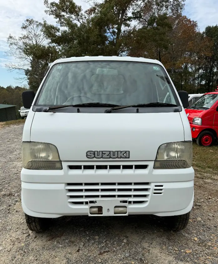 2000 Suzuki Carry 4WD, a white Kei Truck, for sale at Mayberry Mini Trucks in Mount Airy, NC (photo 2 of 18)