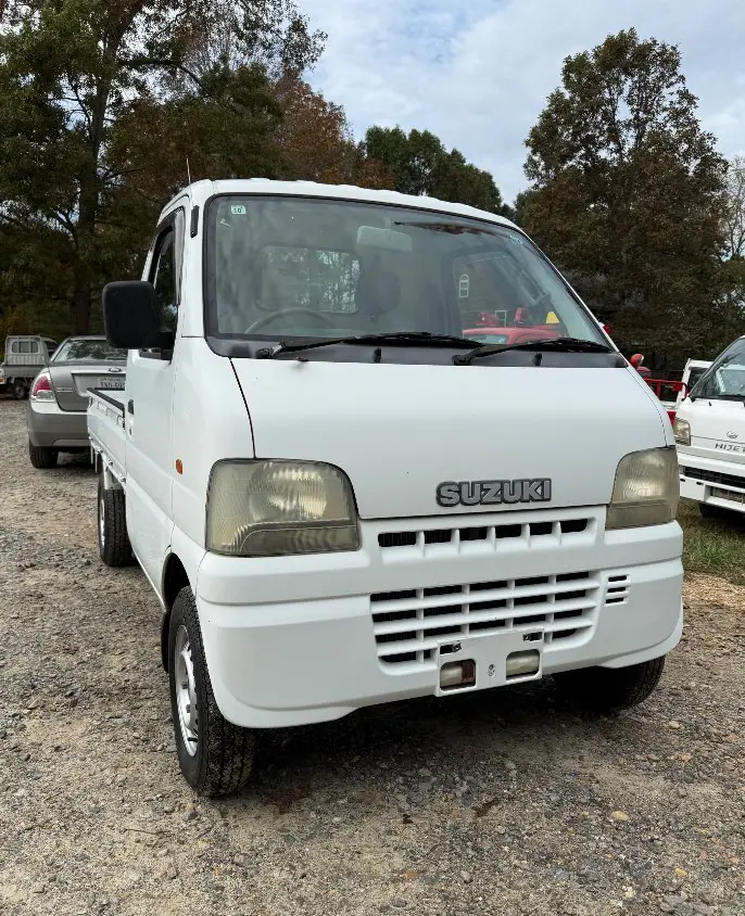 2000 Suzuki Carry 4WD, a white Kei Truck, for sale at Mayberry Mini Trucks in Mount Airy, NC (photo 3 of 18)