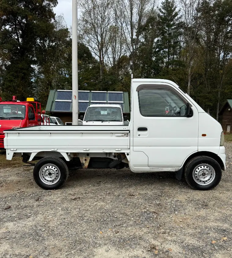 2000 Suzuki Carry 4WD, a white Kei Truck, for sale at Mayberry Mini Trucks in Mount Airy, NC (photo 4 of 18)