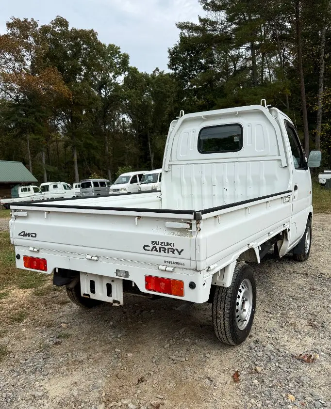 2000 Suzuki Carry 4WD, a white Kei Truck, for sale at Mayberry Mini Trucks in Mount Airy, NC (photo 5 of 18)