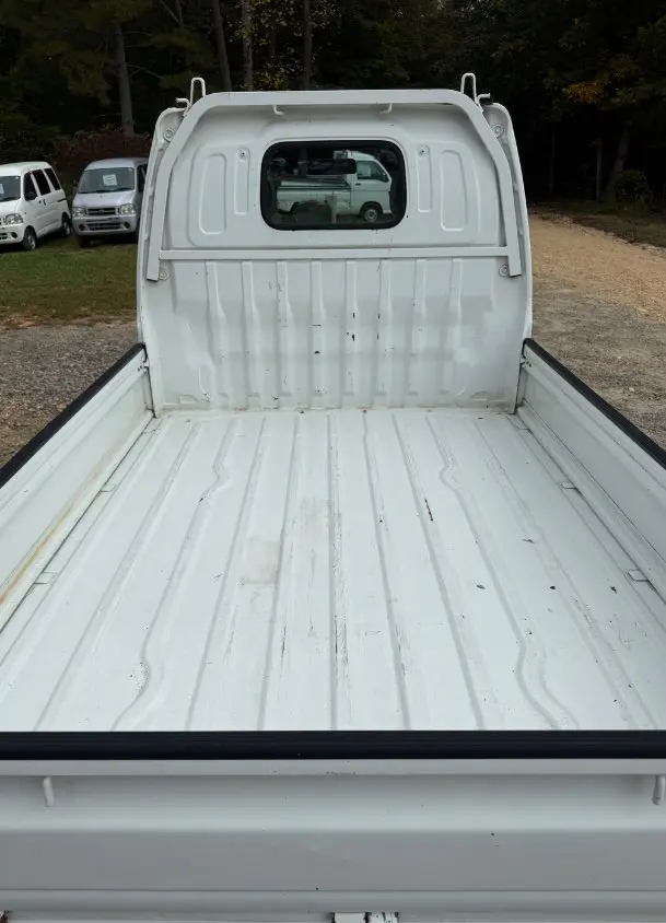2000 Suzuki Carry 4WD, a white Kei Truck, for sale at Mayberry Mini Trucks in Mount Airy, NC (photo 7 of 18)