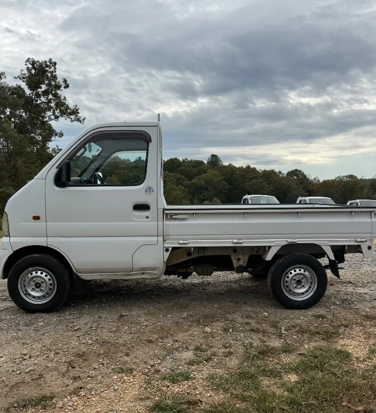 2000 Suzuki Carry 4WD, a white Kei Truck, for sale at Mayberry Mini Trucks in Mount Airy, NC (photo 9 of 18)