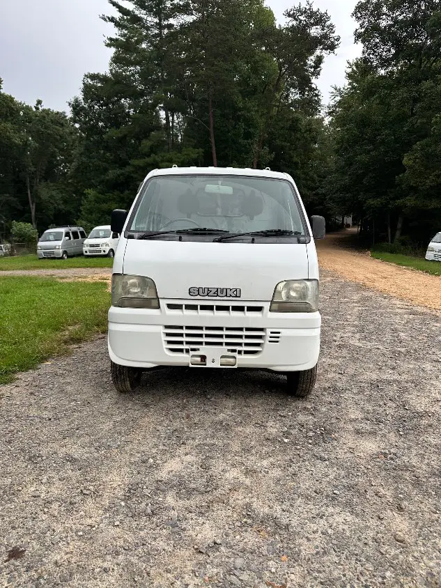 2000 Suzuki Carry 4WD, a white Kei Truck, for sale at Mayberry Mini Trucks in Mount Airy, NC (photo 4 of 20)