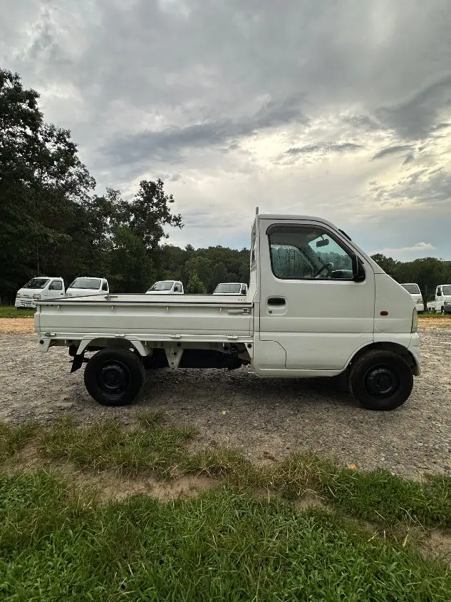 2000 Suzuki Carry 4WD, a white Kei Truck, for sale at Mayberry Mini Trucks in Mount Airy, NC (photo 6 of 20)
