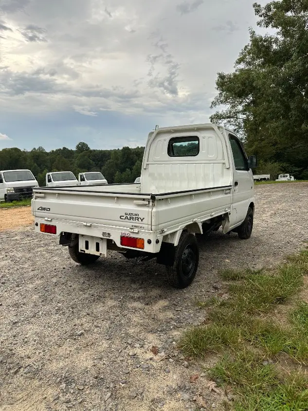 2000 Suzuki Carry 4WD, a white Kei Truck, for sale at Mayberry Mini Trucks in Mount Airy, NC (photo 7 of 20)