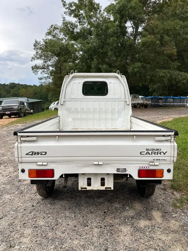 2000 Suzuki Carry 4WD, a white Kei Truck, for sale at Mayberry Mini Trucks in Mount Airy, NC (photo 8 of 20)