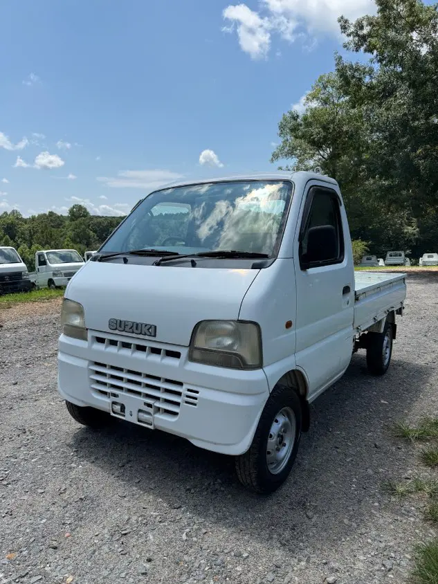 2000 Suzuki Carry 4WD, a white Kei Truck, for sale at Mayberry Mini Trucks in Mount Airy, NC (photo 1 of 17)