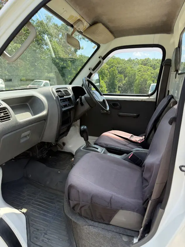 2000 Suzuki Carry 4WD, a white Kei Truck, for sale at Mayberry Mini Trucks in Mount Airy, NC (photo 10 of 17)
