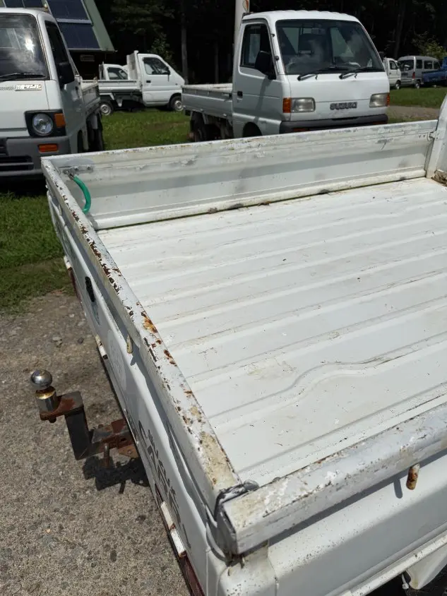 2000 Suzuki Carry 4WD, a white Kei Truck, for sale at Mayberry Mini Trucks in Mount Airy, NC (photo 16 of 17)