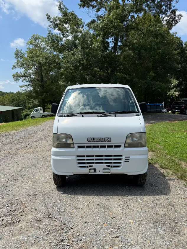 2000 Suzuki Carry 4WD, a white Kei Truck, for sale at Mayberry Mini Trucks in Mount Airy, NC (photo 2 of 17)