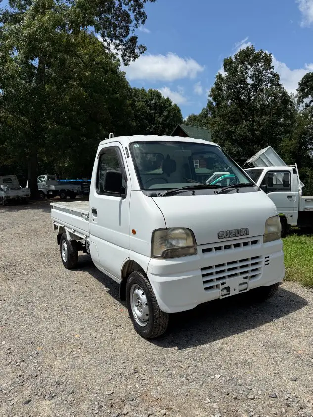 2000 Suzuki Carry 4WD, a white Kei Truck, for sale at Mayberry Mini Trucks in Mount Airy, NC (photo 3 of 17)
