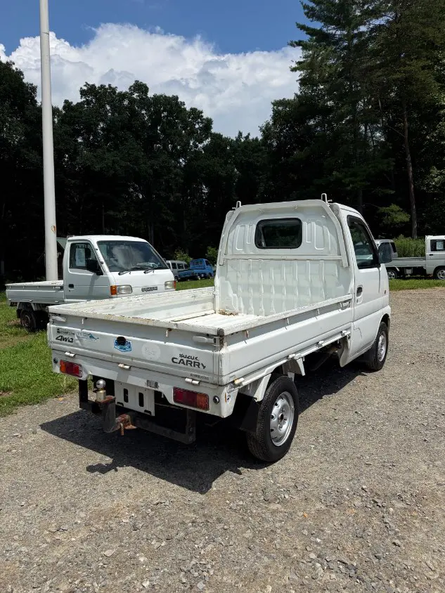 2000 Suzuki Carry 4WD, a white Kei Truck, for sale at Mayberry Mini Trucks in Mount Airy, NC (photo 4 of 17)