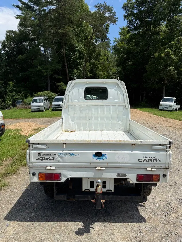 2000 Suzuki Carry 4WD, a white Kei Truck, for sale at Mayberry Mini Trucks in Mount Airy, NC (photo 5 of 17)