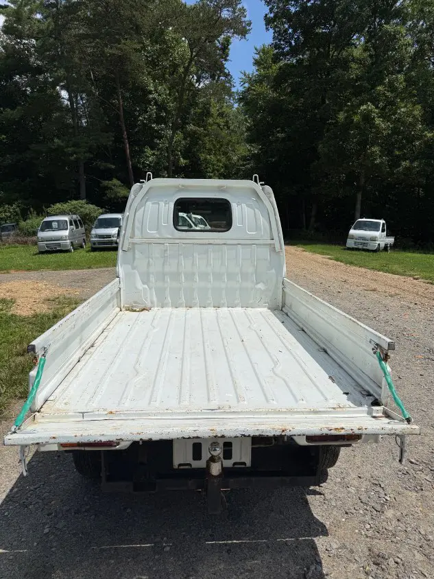 2000 Suzuki Carry 4WD, a white Kei Truck, for sale at Mayberry Mini Trucks in Mount Airy, NC (photo 6 of 17)