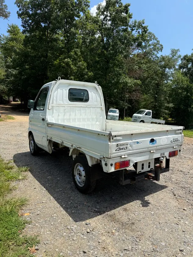 2000 Suzuki Carry 4WD, a white Kei Truck, for sale at Mayberry Mini Trucks in Mount Airy, NC (photo 7 of 17)