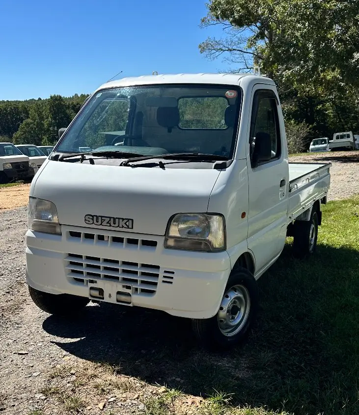 2000 Suzuki Carry 4WD, a white Kei Truck, for sale at Mayberry Mini Trucks in Mount Airy, NC (photo 1 of 15)