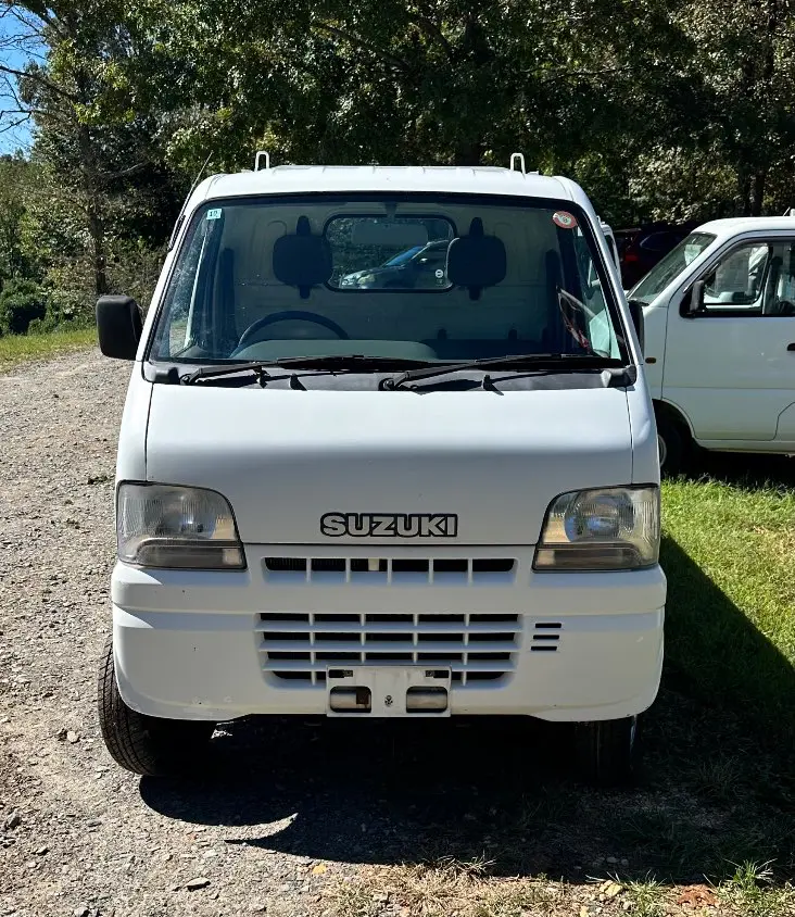 2000 Suzuki Carry 4WD, a white Kei Truck, for sale at Mayberry Mini Trucks in Mount Airy, NC (photo 2 of 15)