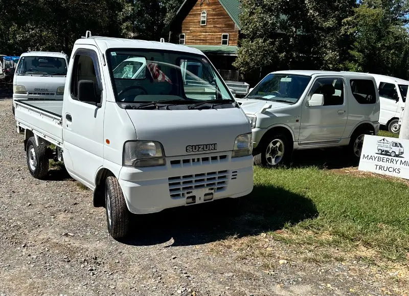 2000 Suzuki Carry 4WD, a white Kei Truck, for sale at Mayberry Mini Trucks in Mount Airy, NC (photo 3 of 15)