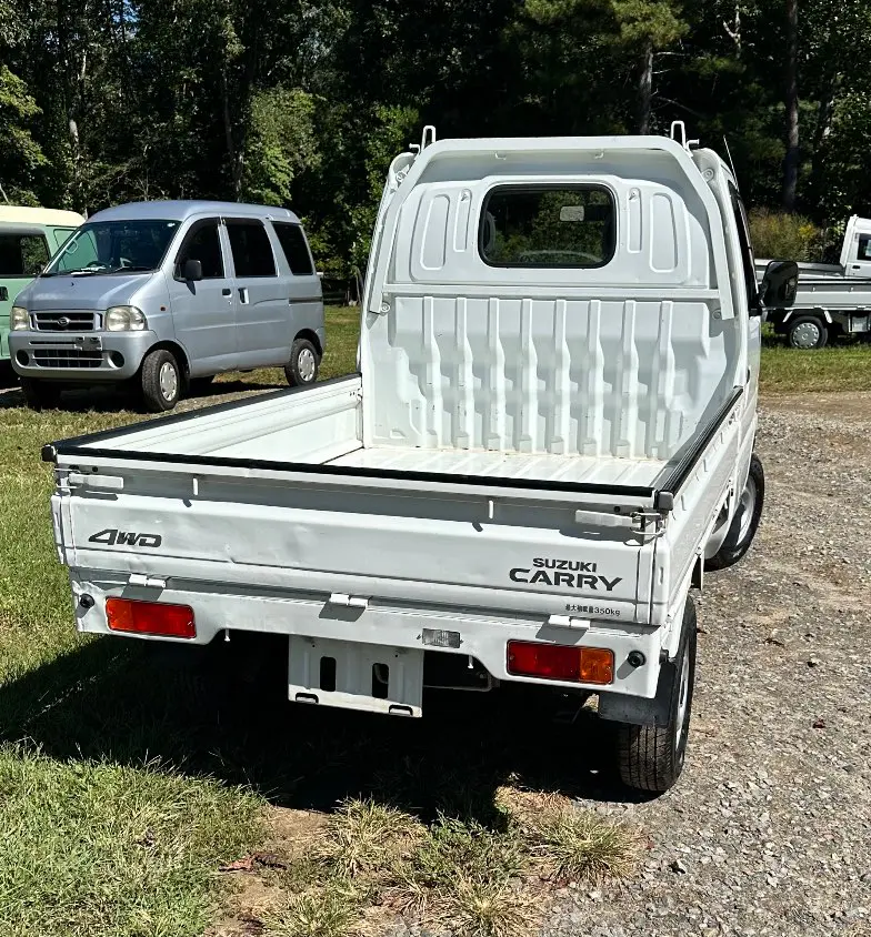 2000 Suzuki Carry 4WD, a white Kei Truck, for sale at Mayberry Mini Trucks in Mount Airy, NC (photo 5 of 15)