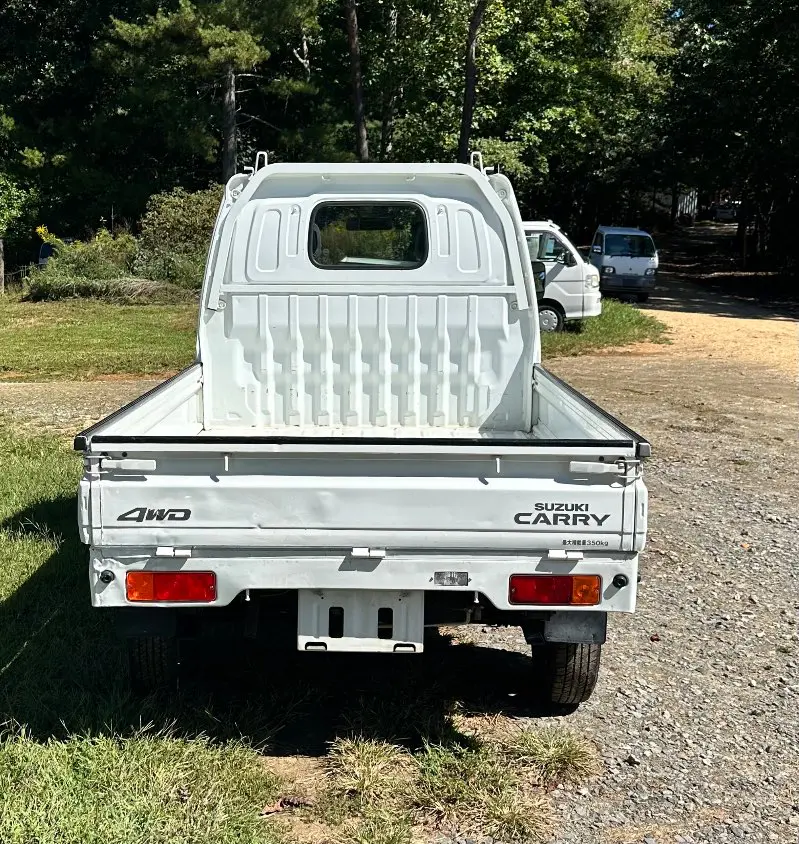 2000 Suzuki Carry 4WD, a white Kei Truck, for sale at Mayberry Mini Trucks in Mount Airy, NC (photo 6 of 15)