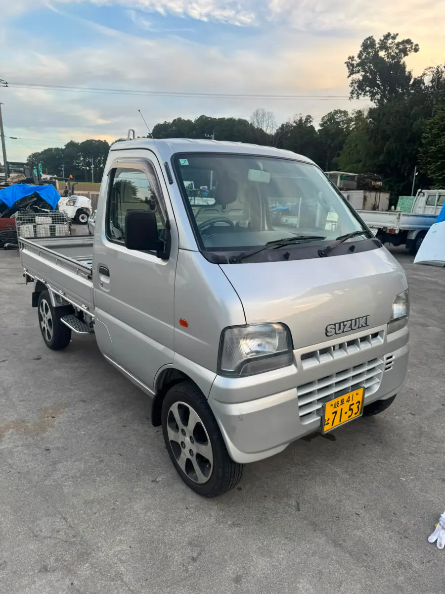 2000 Suzuki Carry 4x4, a silver Kei Truck, for sale at Skyline Kei Trucks in Houston, TX (photo 1 of 10)
