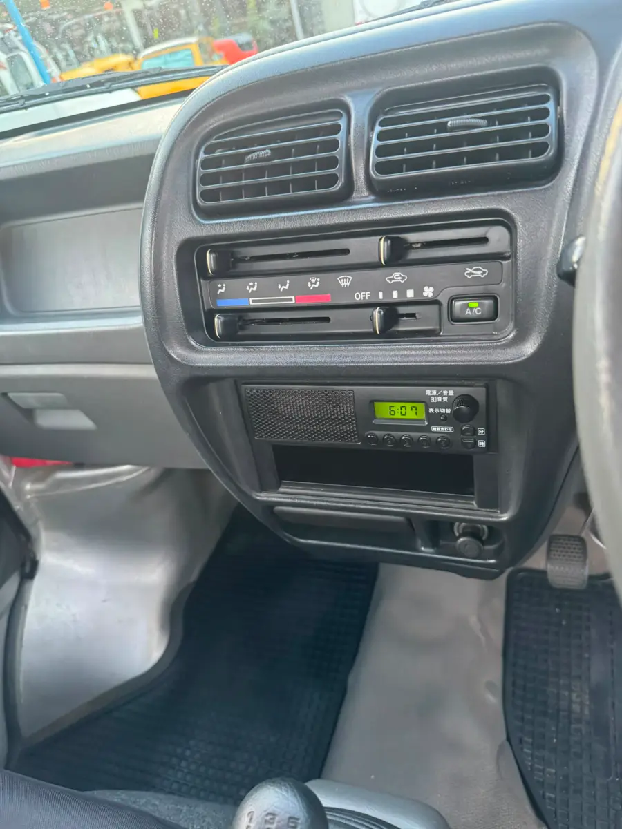 2000 Suzuki Carry 4x4, a silver Kei Truck, for sale at Skyline Kei Trucks in Houston, TX (photo 10 of 10)