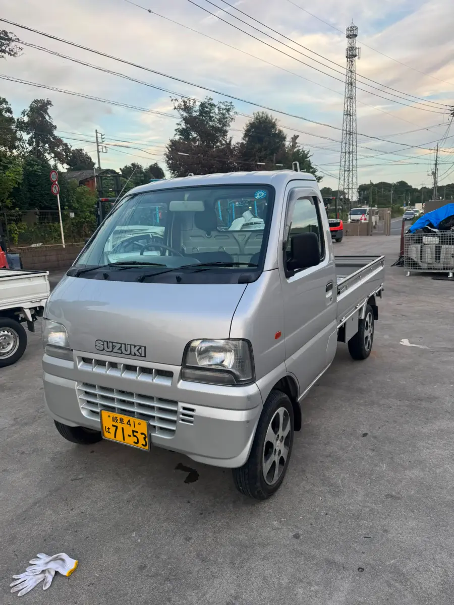 2000 Suzuki Carry 4x4, a silver Kei Truck, for sale at Skyline Kei Trucks in Houston, TX (photo 2 of 10)